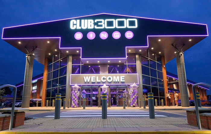 Club 3000 Bingo Leeds exterior at night with illuminated purple signage