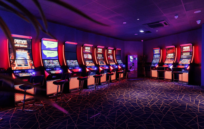 Mood lighting illuminates the slot machine at Club 3000 Kilmarnock