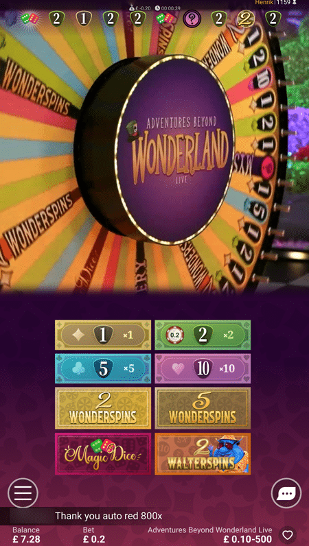Adventures Beyond Wonderland Live wheel with Wonderspins segments at Buzz Casino